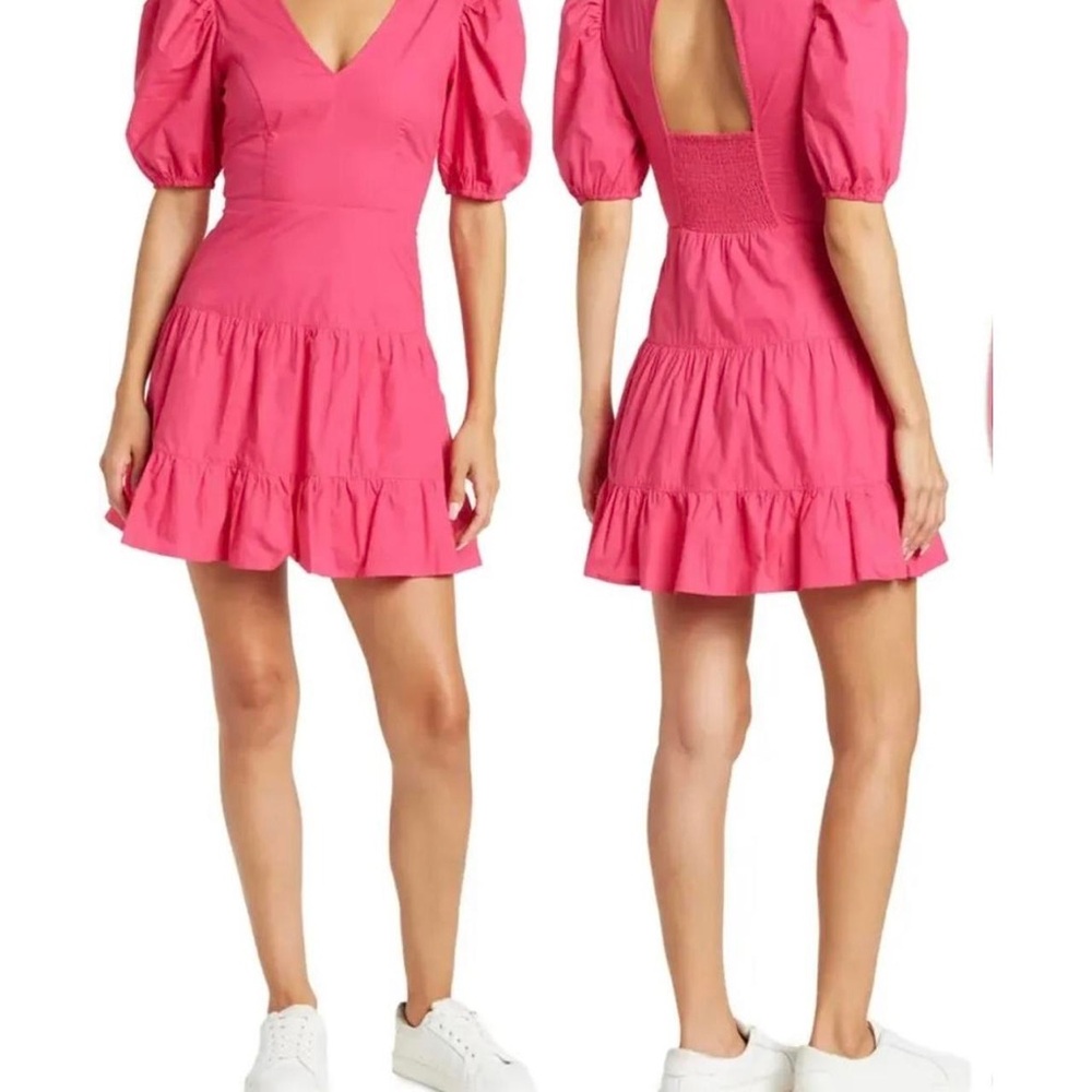 This hot pink Dress is all you need for the Summer. The beauty is in the back.